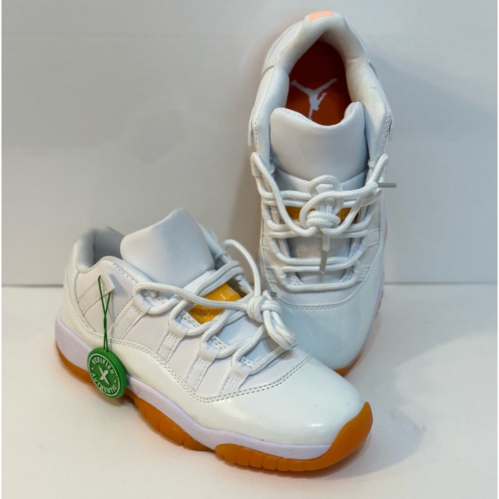 Jordan 11 Retro Low Top Sneakers 
Citrus (Women's)